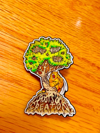 Roots of Creation x Raised Fist Collab Pin