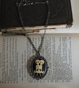 Image of CONJOINED SIAMESE TWINS SKELETON SKULLS LARGE ornate Cameo NECKLACE GOTH HORROR 