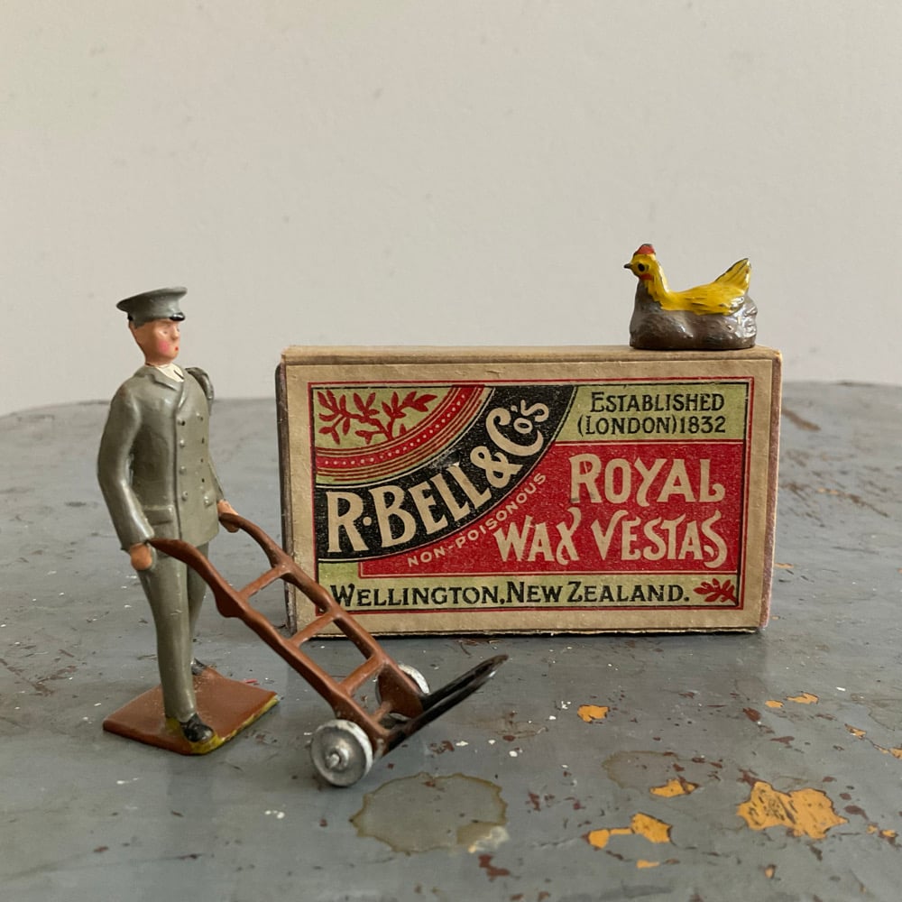 Image of Guy With Chook & Vesta Box