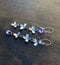 Image of Tiered Lilac Flower Lilac Amethyst Mismatch/Asymmetrical Statement Earrings
