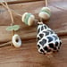 Image of Hawaiian Hebrew Cone Shell Necklace with Puka Shells and Sea Glass 