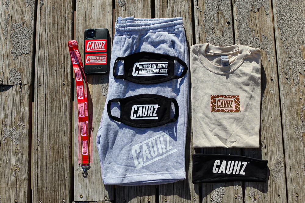 Cauhz™️ Giraffe Print Sand Tee