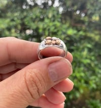 Image 1 of small silver and rose and yellow gold pebble ring 