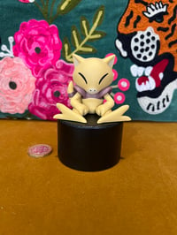 Image 1 of Sitting Abra Plinth Display