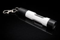 Keychain glass hitter with protective sleeve