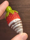 White chocolate dipped milk chocolate drizzle
