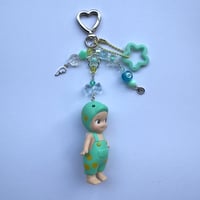 Image 1 of Dino baby trinket keychain