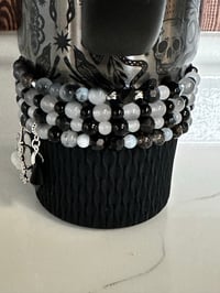 Image 2 of Black, White and Silver Skull Tumbler Bracelet Stack