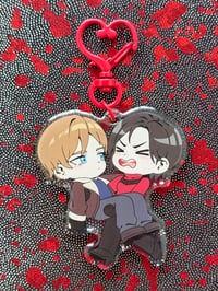Aeon keychain (Ada carrying Leon)