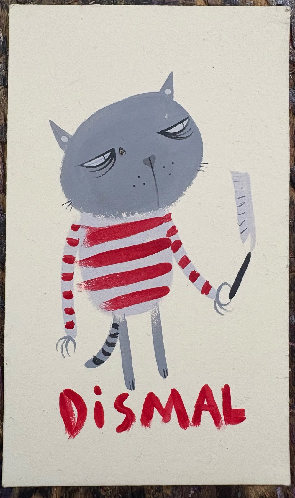 Tiny painting cat with blade