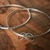 Symbolic Linked Bangle