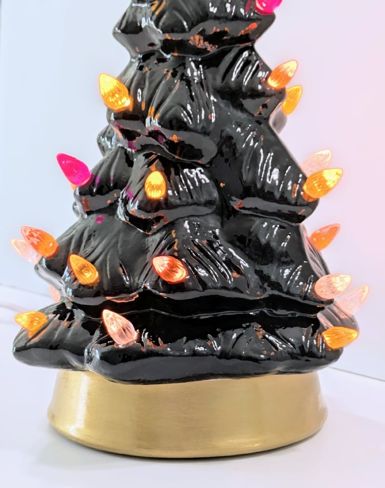 Image of Black Ceramic Lighted Halloween Tree With Gold Base and Various Ornaments