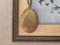 Image 1 of Sautoir médaillon en bronze 