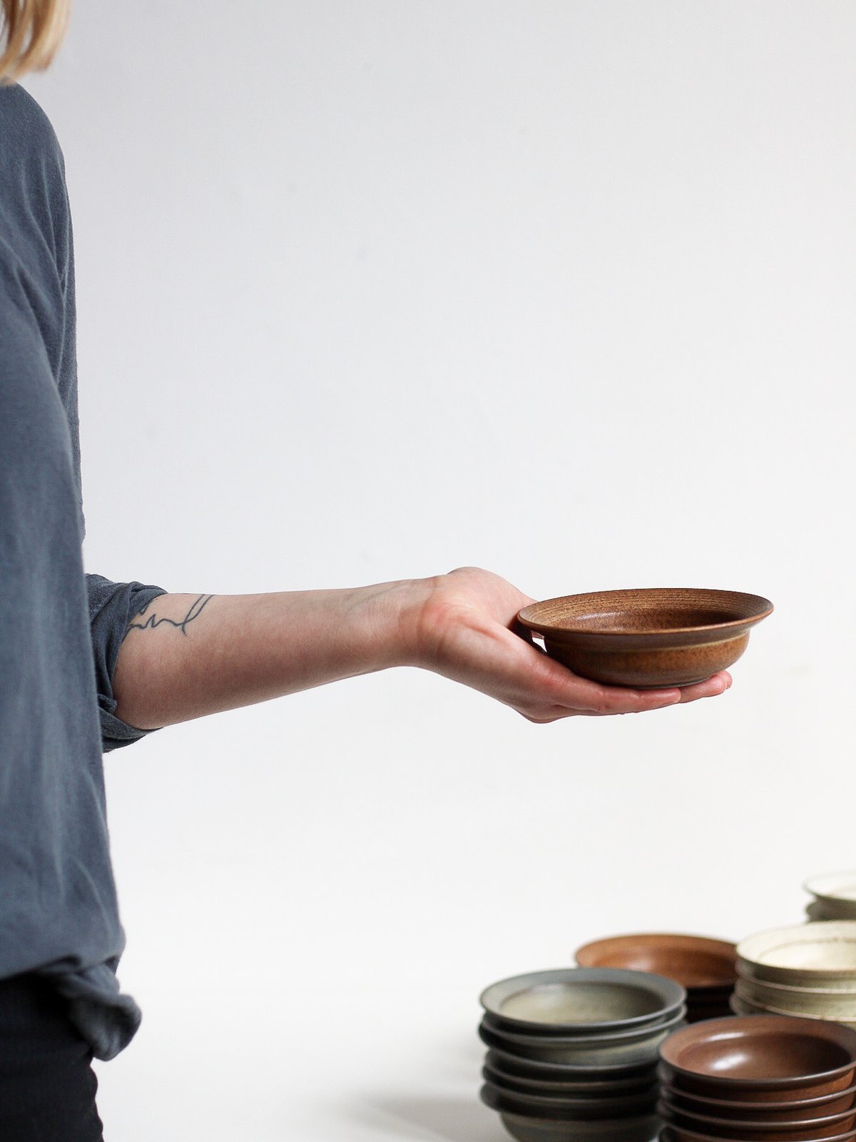 Image of small lipped dish in umber