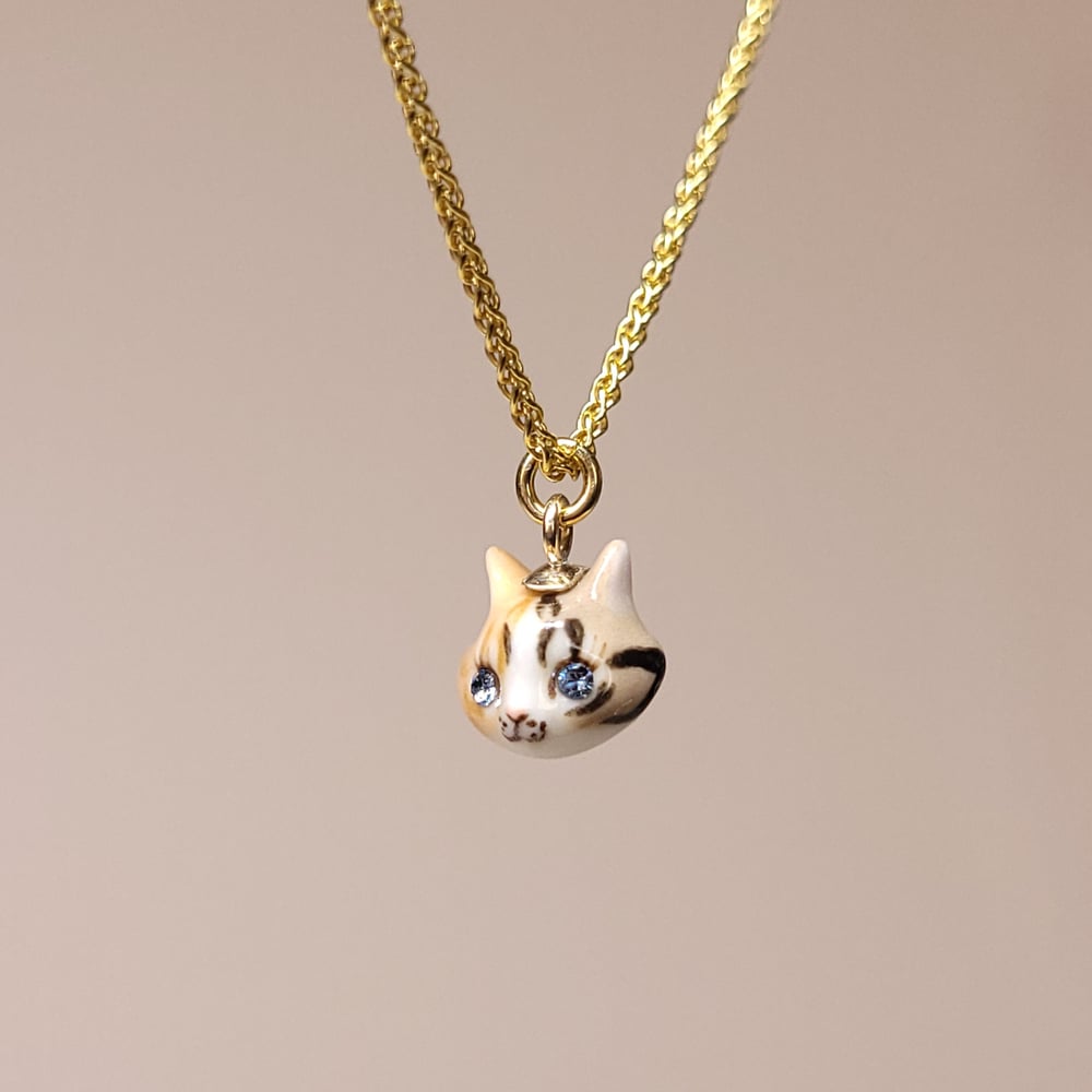 Image of Tabico Porcelain & Gold Vermeil Teeny Tiny Cat Pendant