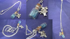 Image of Stunning Unusual Alice In Wonderland White Rabbit Small Bottle Necklace Drink Me