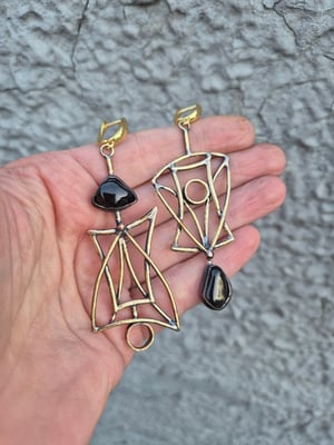 Asymmetrical brass earrings 
