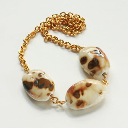 Image of Pot of Gold - Elegant Necklace With Cream Ceramic Stones
