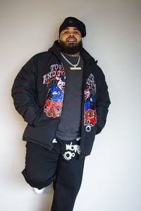 Image 3 of “To Protect and To Disturb” Puffer Jacket