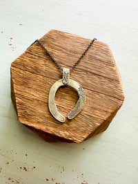 Image 1 of sterling silver Rumi quote naja pendant
