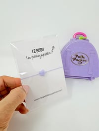 Image 2 of Ensemble bracelet et Polly Pocket valise violette ski