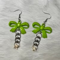 Bow snake vertabrae earrings 
