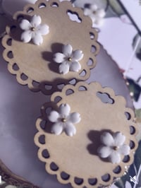 White floral studs 
