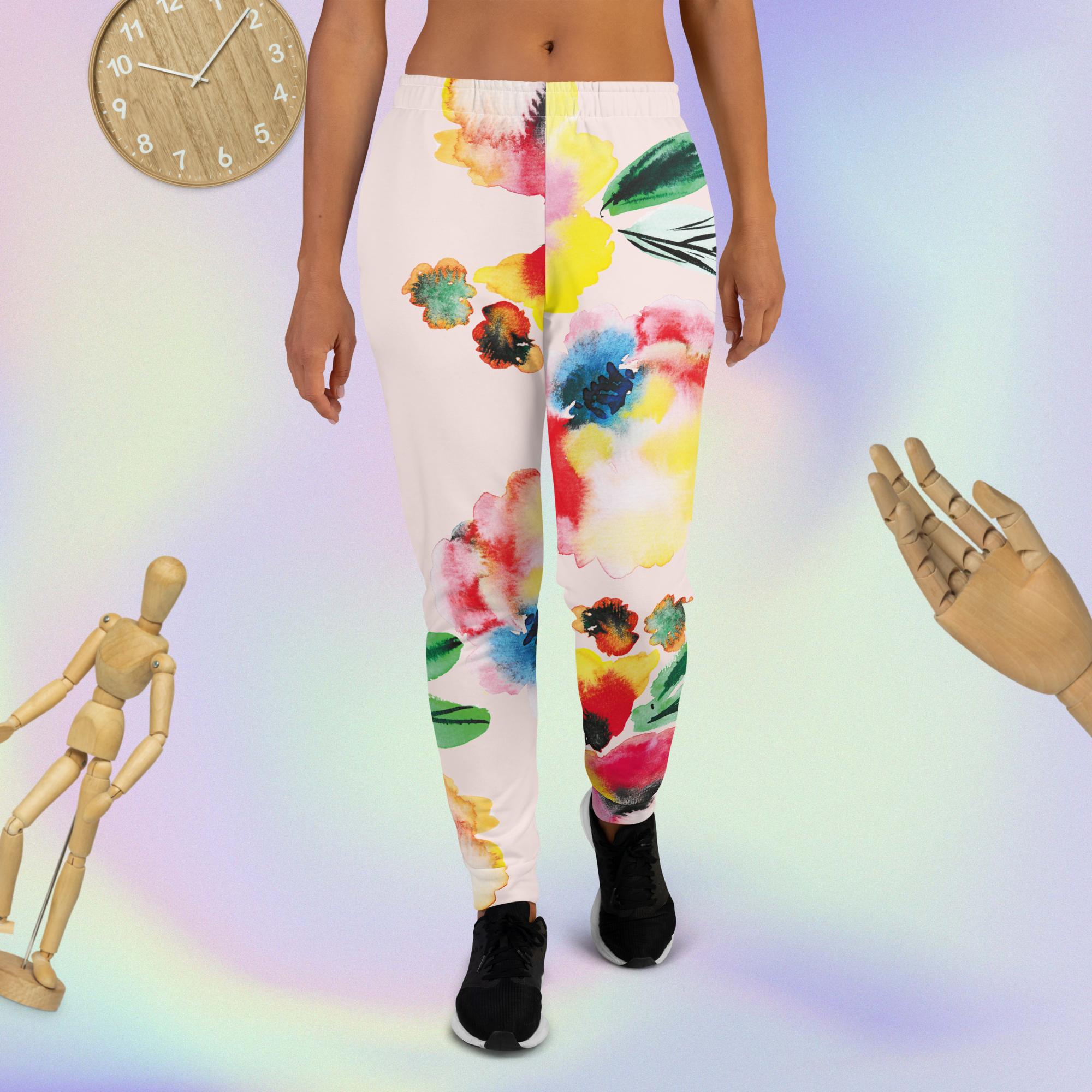 https://assets.bigcartel.com/product_images/76e7fbd4-81f6-4e33-b132-469a42691e22/all-over-print-recycled-womens-joggers-white-front-650f27c575cb1.jpg?auto=format&fit=max&w=2000