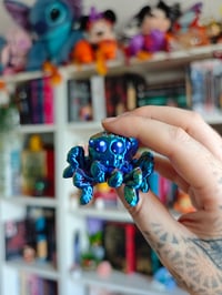 Image 3 of Araña holografica