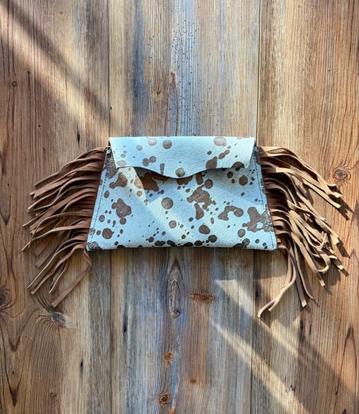 Image of Cowhide clutches 