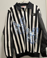 Image 1 of Hockey referee drip. 