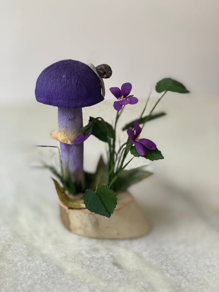Image of Cortinarius Archeri mushroom and violet specimen 