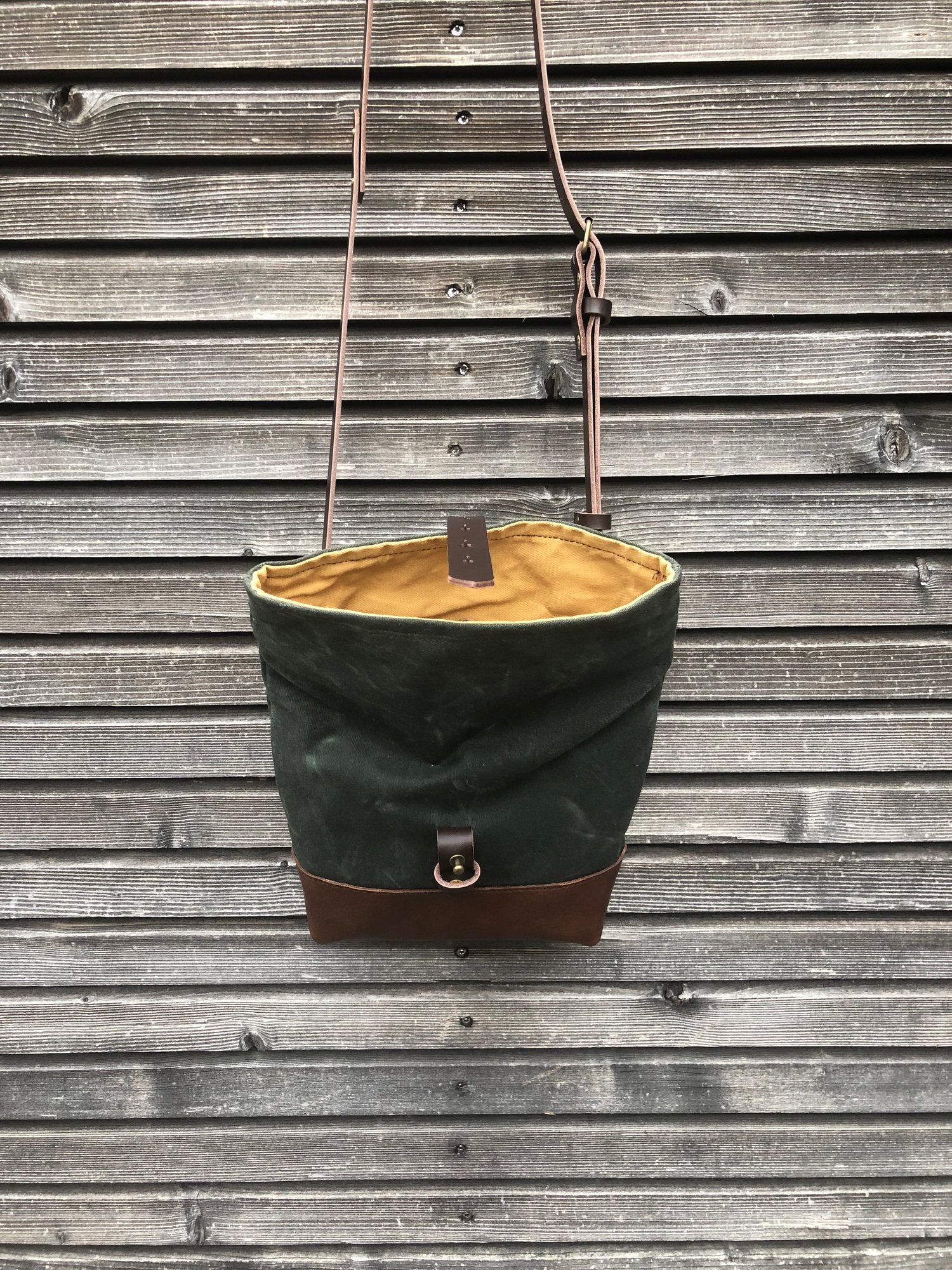 Image of Forest green waxed canvas day bag with leather bottom