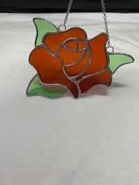 Image 3 of Orange rainbow rose