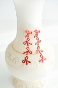 Image 1 of Lazos colgantes