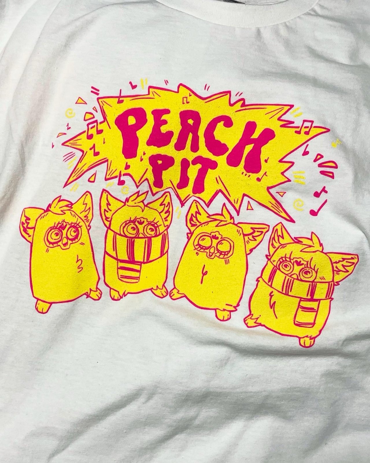 Peach Pit Christmas Furby T-Shirt | Reasons To Live Books and Records