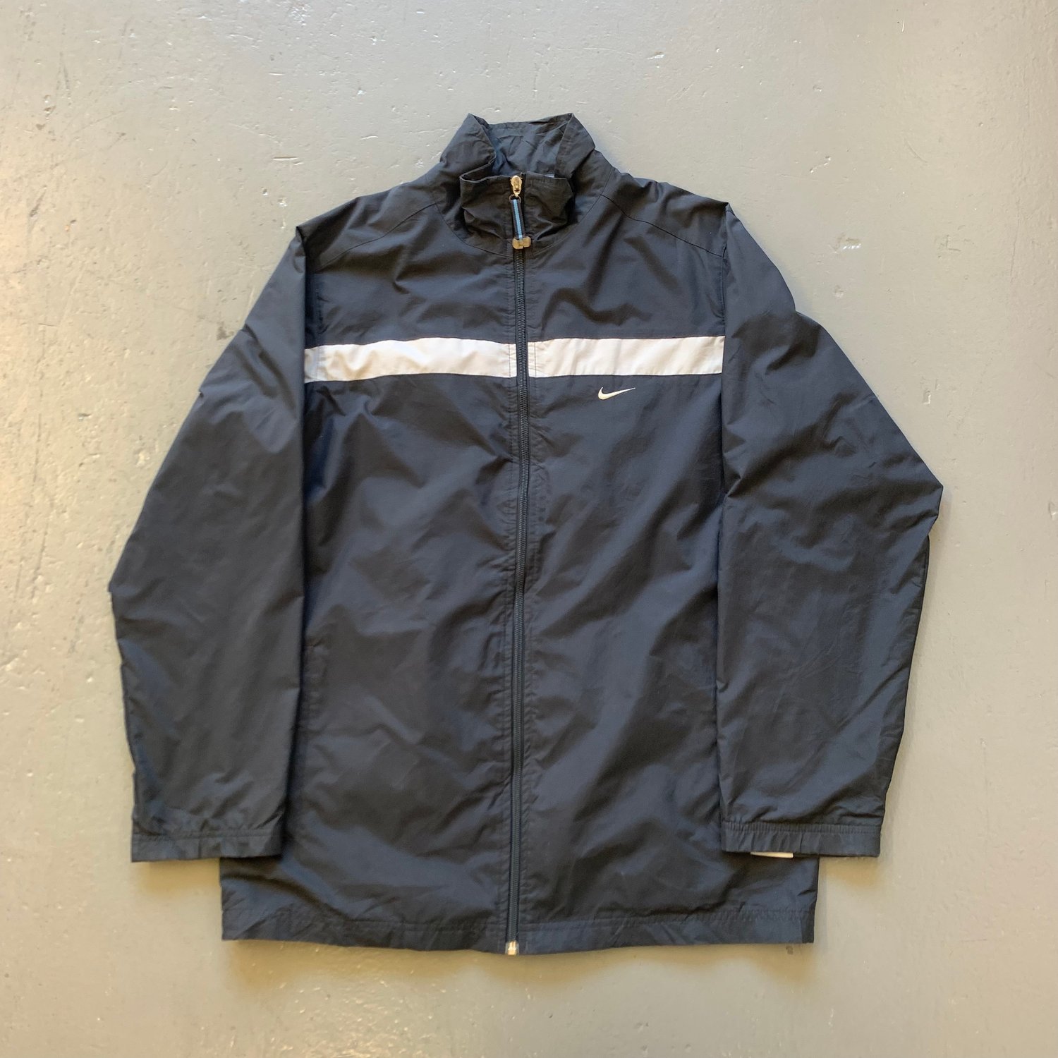 Image of Vintage Nike spellout windbreaker jacket size small 