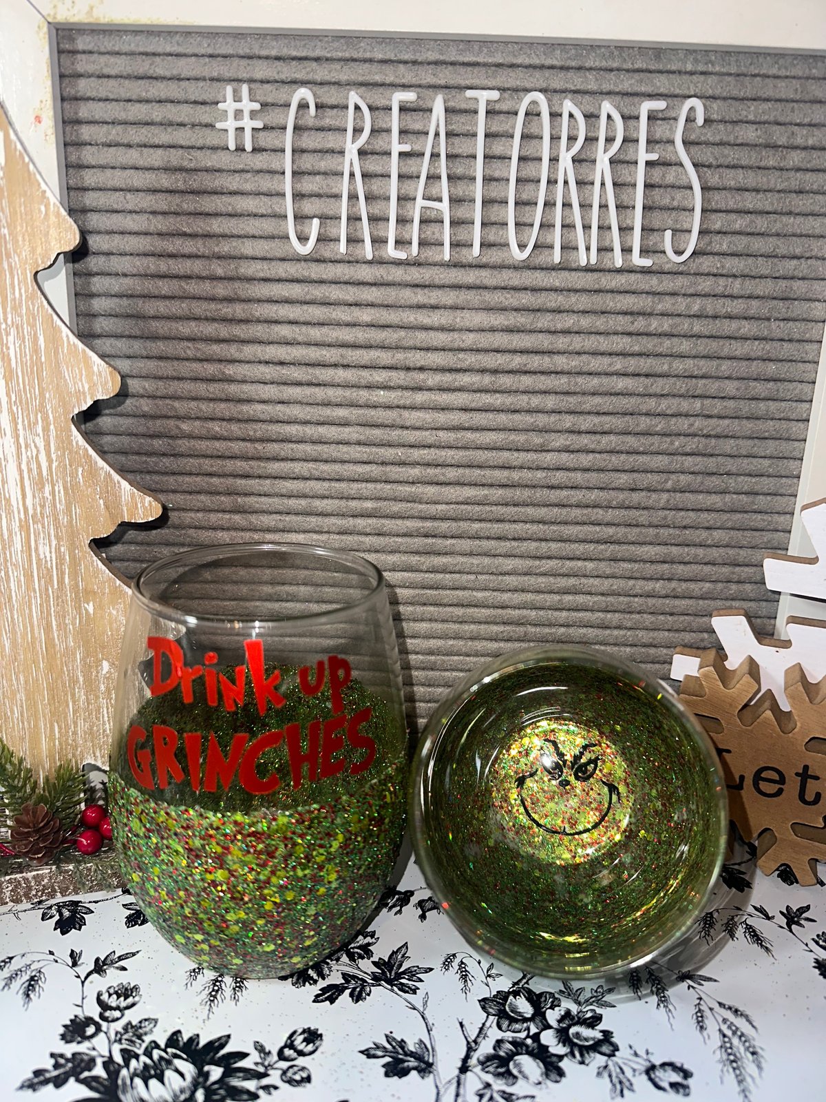 Wine Glasses with Green Liquid and the Grinch · Creative Fabrica