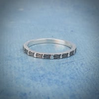 Image 1 of ‘Echo’ hand stamped Sterling Silver Stacking Ring - sunburst pattern