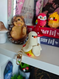 Image 1 of Llavero pato platano Clicker 