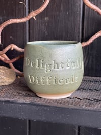 Delightfully Difficult Mørkegrøn