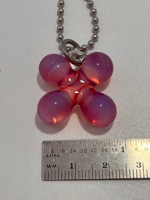 Image of ruby over opaline clover