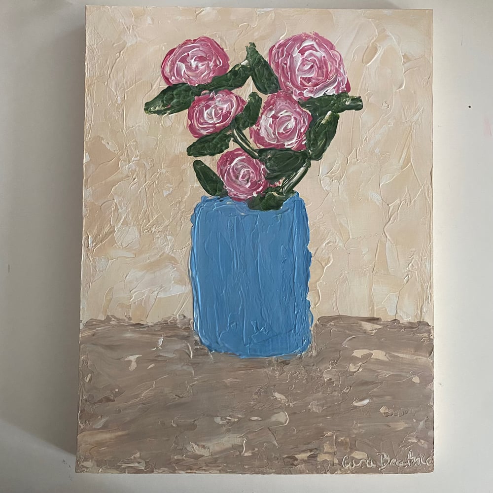 Image of Garden roses in a vase