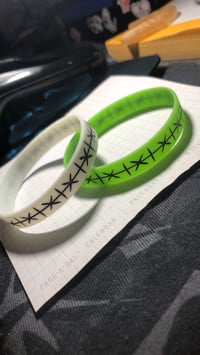 Image 4 of Glowing Stitches Wristbands 