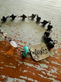 Image 2 of faceted gemstone and sterling silver medallion bracelet