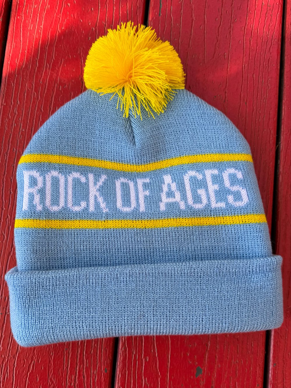 Image of ROCK OF AGES POM POM BEANIE