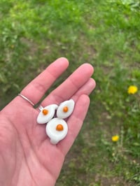 Image 1 of “eggcellent” glass egg hat pins (set of 3)