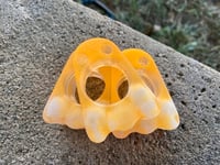 Image 1 of Transparent orange glitter glow skulls 