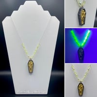 Image of Lovers Coffin Yellow Uranium Glass Necklace