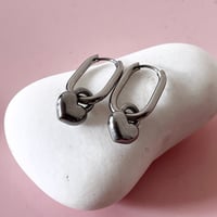 Image 3 of Oval Huggie Hoops with Lock Heart
